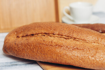 bread on a wooden table kitchen knife baking breakfast