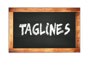 Obraz premium TAGLINES text written on wooden frame school blackboard.