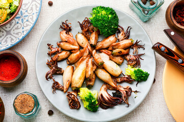 Grilled squids in plate