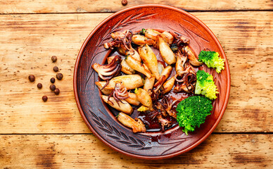 Grilled squids in plate