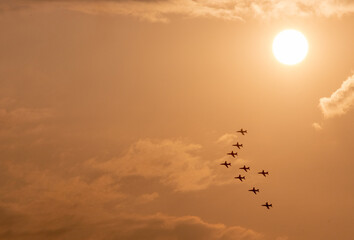 Indian Air Force Surya Kiran Aerobatic Team performs at an air show 