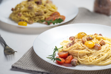 Spaghetti with egg, pancetta, parmesan cheese. Traditional italian cuisine.Carbonara pasta. 