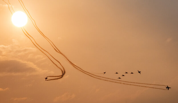 Indian Air Force Surya Kiran Aerobatic Team Performs At An Air Show 