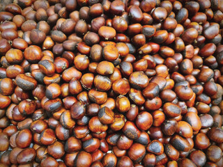 Full Frame Background of Brown Roasted Chestnuts