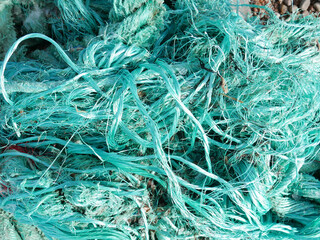 nylon plastic rope pollution at seaside