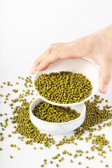 Fresh mung beans on pure white background