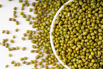 Fresh mung beans on pure white background
