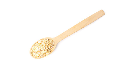 wooden spoon with oatmeal isolated on white