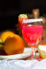 Close-up of a fresh cup of cocktail with strawberry, refreshing summer