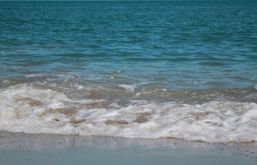 sea ​​shore. Blue waves on the blue sea. Sea shore. Sand. Summer.