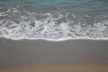 sea ​​shore. Blue waves on the blue sea. Sea shore. Sand. Summer.