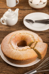 Homemade cake on a rustic wooden table.