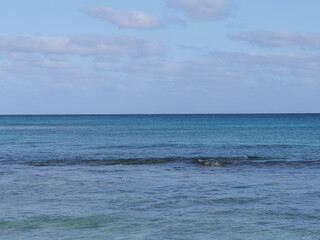 Obraz premium Atlantic Ocean landscapes seen from african Santa Maria town at Sal island in Cape Verde, clear blue sky in 2019 warm sunny spring day on March.
