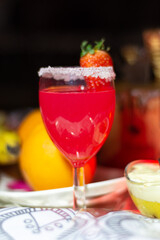 Close-up of a fresh cup of cocktail with strawberry, refreshing summer