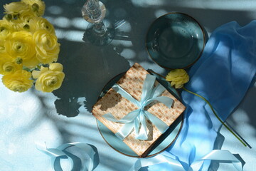 Table served for Passover (Pesach) indoors, with matzah bread as symbolic Pesach (Passover Seder) item.