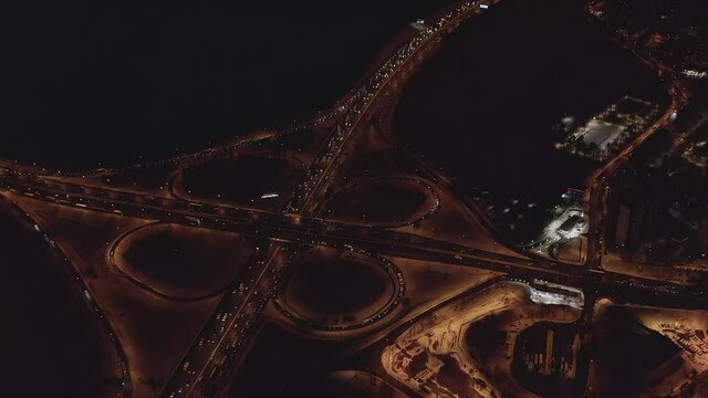 Drone video. Winter, night. Ring road in Moscow, interchanges
