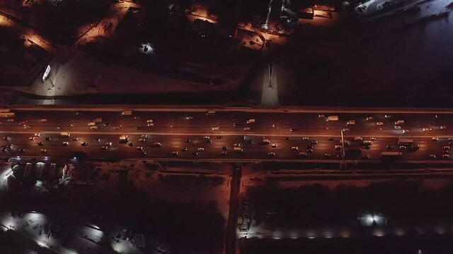 Drone video. Winter, night. Ring road in Moscow, interchanges