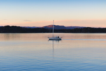 Boat out for a chilly sail at golden hour