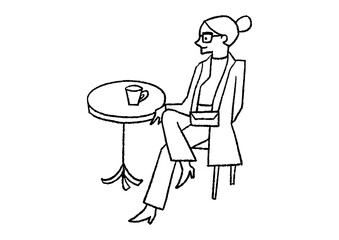 カフェにいるメガネをしてコートを着た女性02