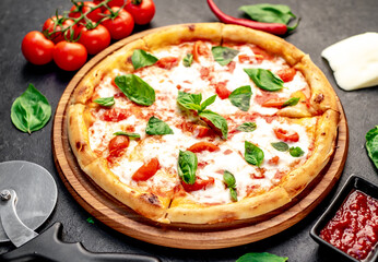 Pizza Margherita on a stone background