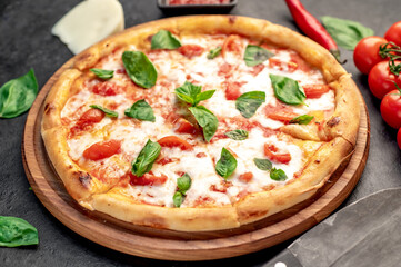 Pizza Margherita on a stone background 