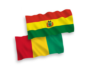 Flags of Bolivia and Guinea on a white background
