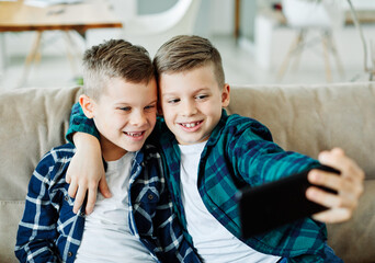 child brother friend having fun taking selfie mobile phone technology smartphone  happy kid