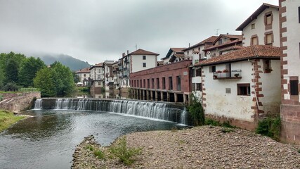 Fototapeta na wymiar Baztan river and Elizondo village, Baztan valley, Navarre, Spain