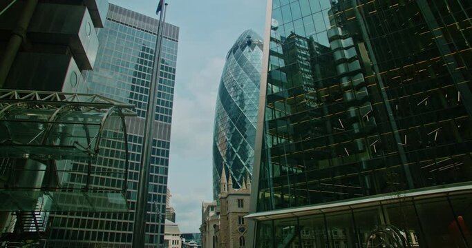 London Gherkin cityscape, futuristic city, business area and businessmen