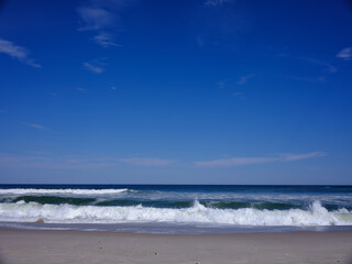 Nearly empty beaches on Island Beach state park in New Jersey the day the beaches opened during the covid-19 pandemic