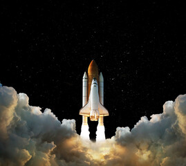 Launch of Space,Spaceship takes off into the night sky.Rocket starts into space concept.Elements of...