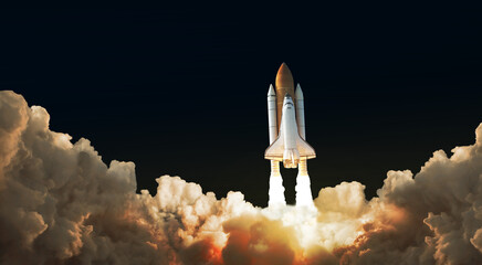 Launch of Space,Spaceship takes off into the night sky.Rocket starts into space concept.Elements of...