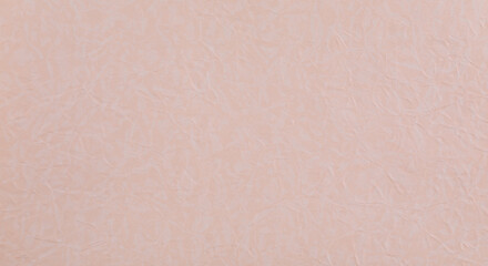 abstract background of crumpled pink wrapping paper