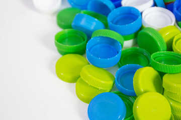 pile of many color of plastic caps, plastic caps for recycle