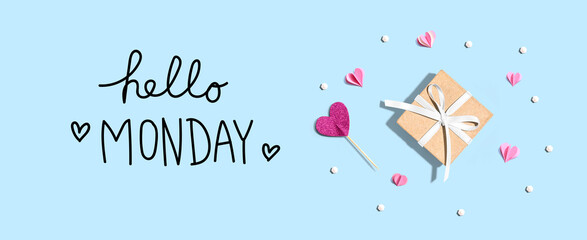 Hello Monday message with a small gift box and paper hearts