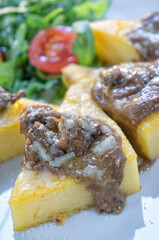 Italian polenta with mushroom sauce