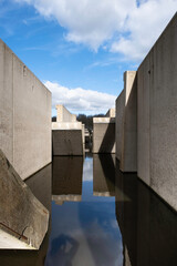 Concrete laboratory test set-up in the middle of an artificial lake, was used in the 1960s for the development of the Delta Works. Device is located in the province of Flevoland in the Netherlands