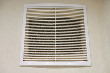 Dirty air ventilation grill of HVAC with clogged filter.