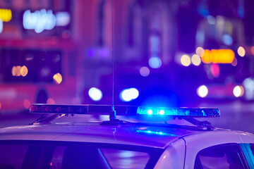 Police car lights at night city street