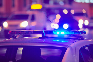 Police car lights at night city street