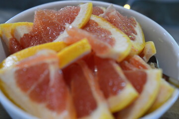 sliced grapefruit  in a bowl
