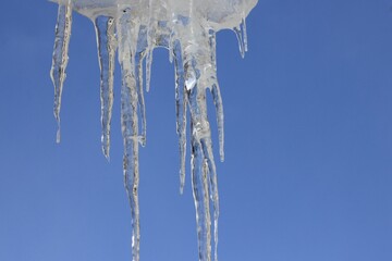 icicles on a blue sky background