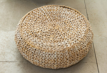 Fototapeta na wymiar Floor paddy old handmade, braided surface of dry corn stems