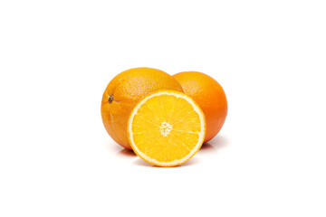 Whole and half sliced delicious and juicy ripe oranges isolated on white background. Three oranges.