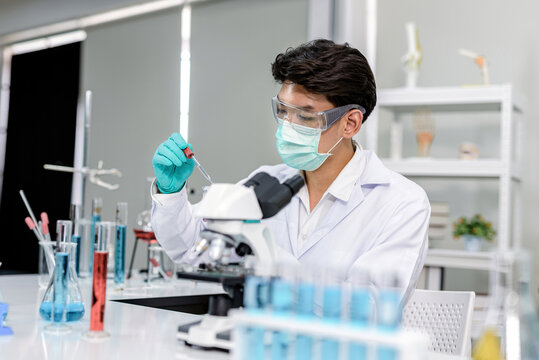 Scientists are experimenting and using dropping pipette lab background.