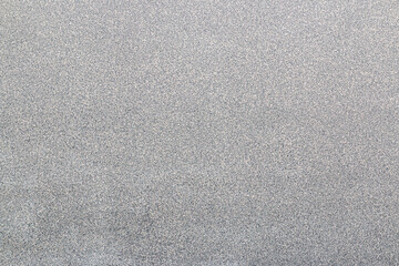 Fototapeta na wymiar gray rough background with irregular pattern