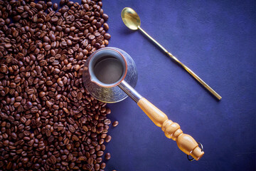 roasted coffee beans on dark background