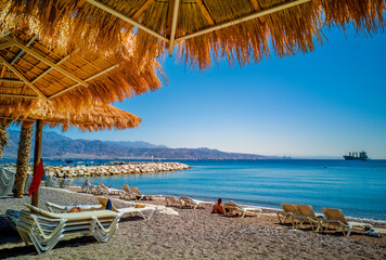 Morning at central public beach in Eilat - famous tourist resort and recreational city in Israel