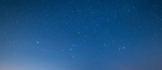 Beautiful blue starry sky. Night photography, astronomical background.