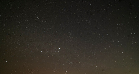 Beautiful winter dark starry sky. Night photography, astronomical background.